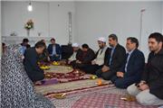 بازدید فرماندار رباط کریم با خانواده معظم شهدا و جانباز در منجیل آباد