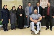 دیدار قهرمان وزنه برداری معلولان جهان با شهردار رباط کریم